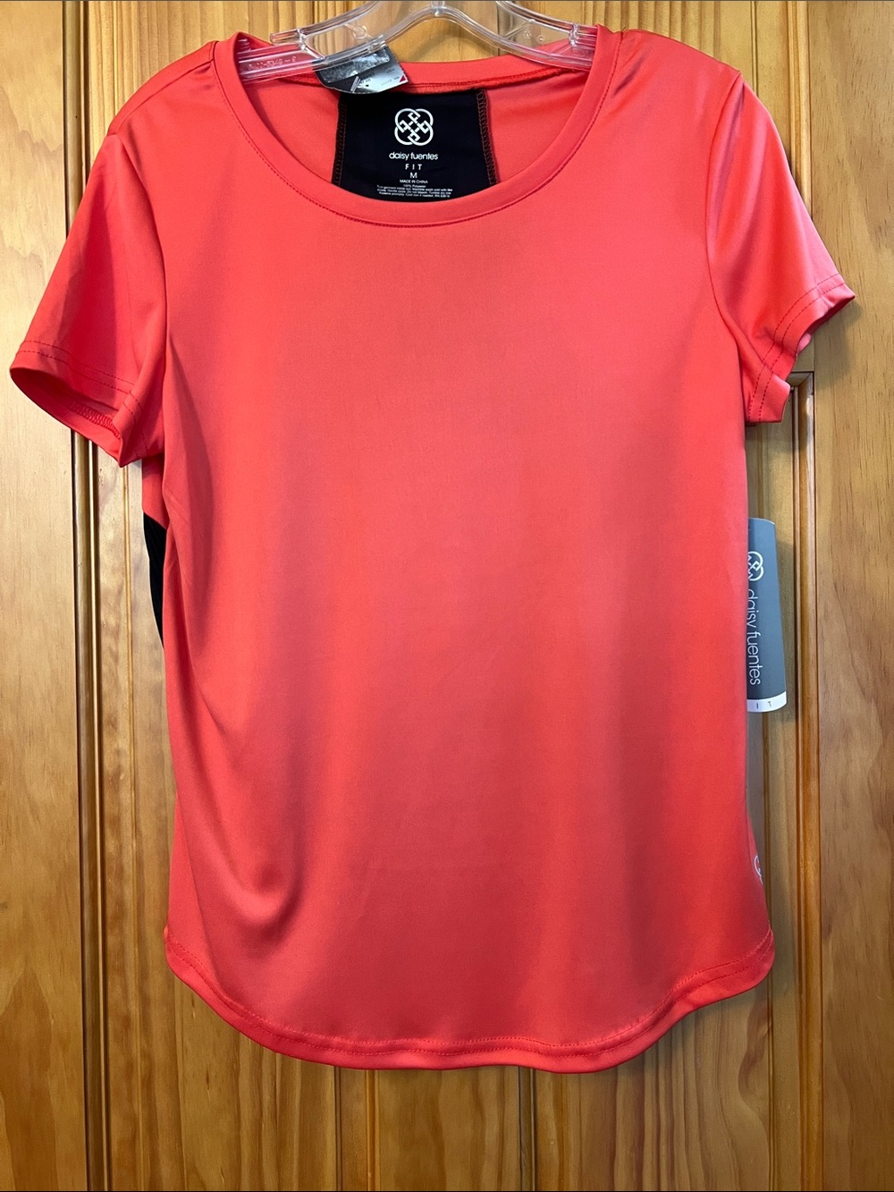 Activewear Tee, rounded at bottom hem, orange front/black back, lightweight